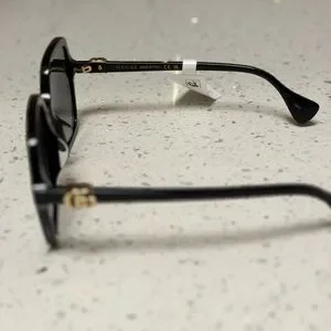 Elegant Black Gucci Sunglasses with Gold Accent Gucci GG1072SA Gucci | Accessories | Elegant Black Gucci Sunglasses With  main image 2